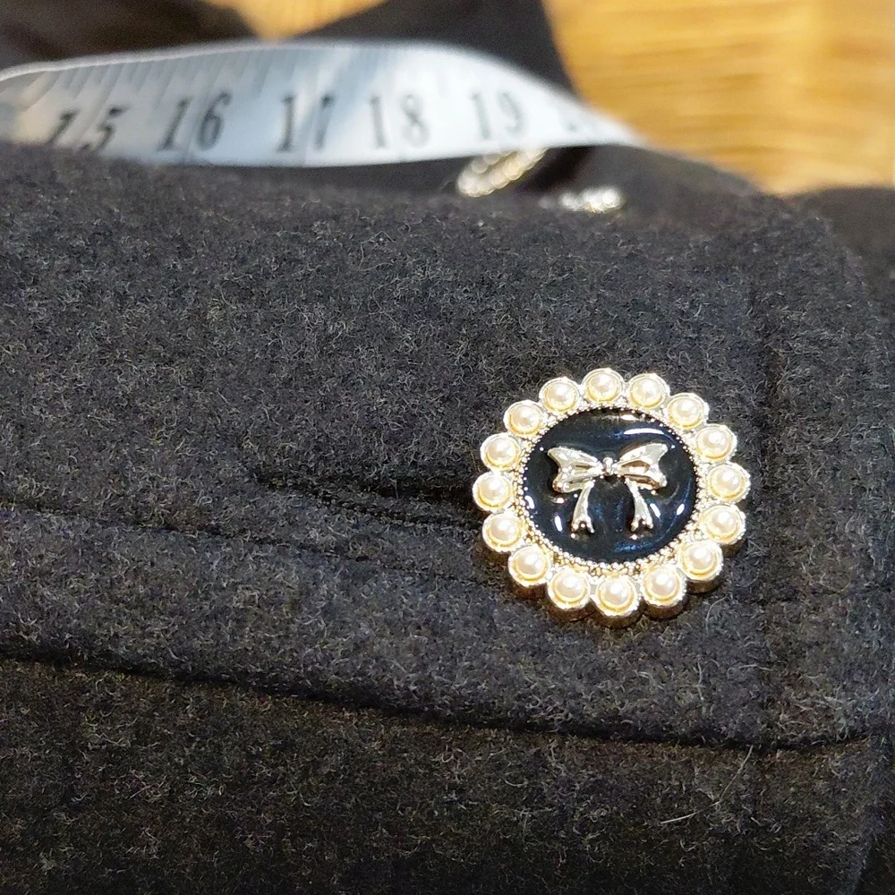 Elegant Black Long Coat with Button Details - Picture 10 of 13